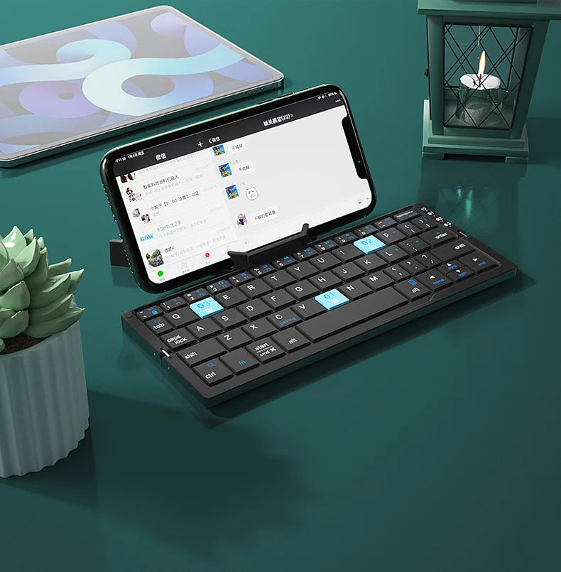 Teclado Bluetooth plegable Jomaa, teclado recargable, mini teclado inalámbrico plegable, teclado de aluminio con soporte para teléfono
