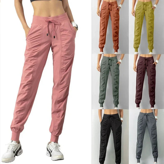 Pantalones deportivos de tela con cordón ajustable para correr, para mujer, de secado rápido, para gimnasio, fitness, con dos bolsillos laterales