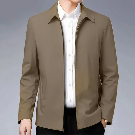 Chaqueta elegante para hombre de mediana edad con solapa y bolsillos con cierre de cremallera para negocios formales o ropa informal en primavera y otoño.