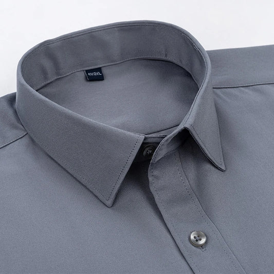 Camisa de negocios de color sólido para hombre, nueva, formal, a la moda, fina, clásica, básica, informal, ajustada, blanca, de manga larga, para uso social, ropa de marca