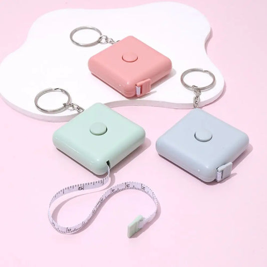 Mini cinta métrica retráctil para medir ropa, cinta métrica de plástico, herramienta de medidas cuadradas, accesorios de costura portátiles