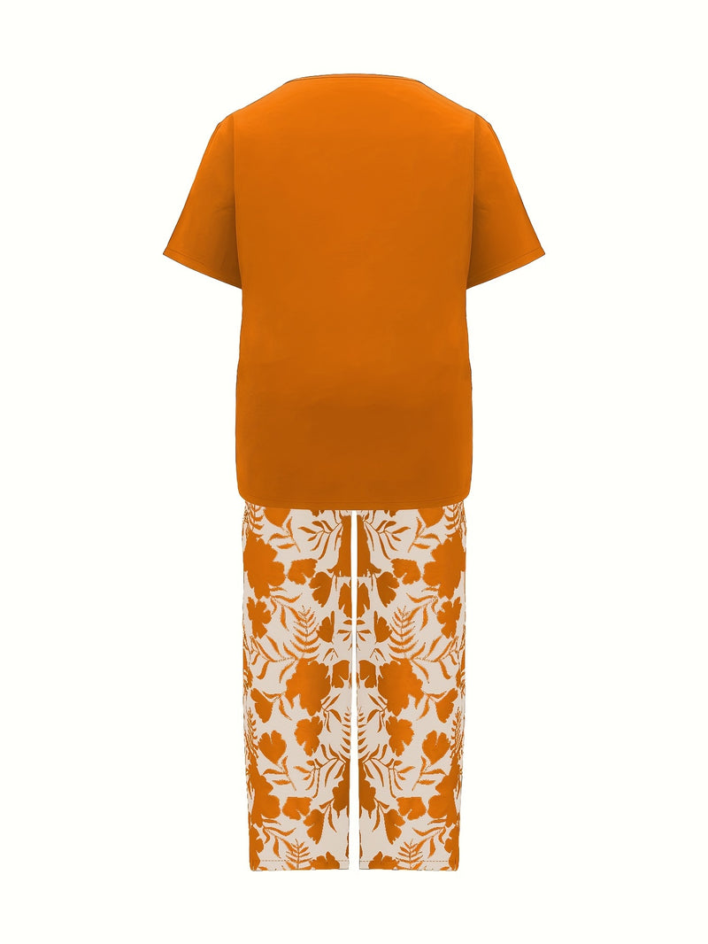 Plus Size Elegant Two-piece Set, Solid Crew Neck Short Sleeve Top & Floral Print Pants Outfits, Women's Plus Size Clothing