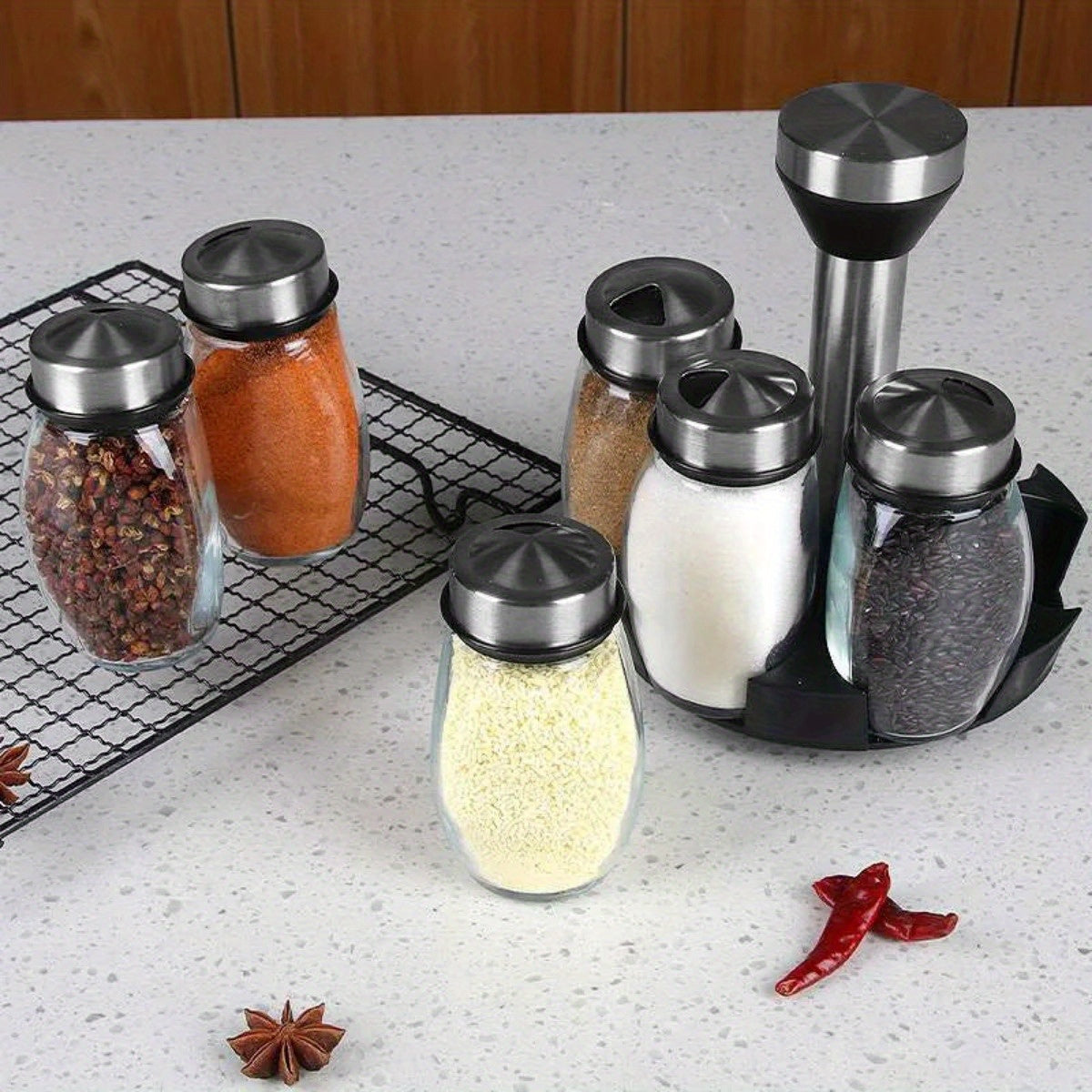 Juego de especiero giratorio: 7 botellas de vidrio para condimentos y saleros con soporte, organizador de cocina multifuncional y fácil de instalar.