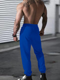 Joggers deportivos informales para hombre con estampado "Security", cintura elástica, cordón ajustable, lavables a máquina y bolsillos.