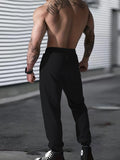 Joggers deportivos informales para hombre con estampado "Security", cintura elástica, cordón ajustable, lavables a máquina y bolsillos.