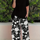 Plus Size Elegant Two-piece Set, Solid Crew Neck Short Sleeve Top & Floral Print Pants Outfits, Women's Plus Size Clothing