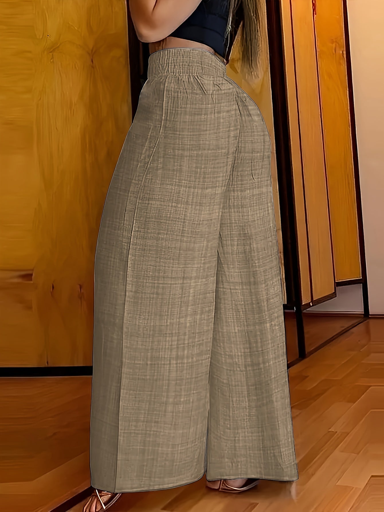 Elegante pantalón ancho con cintura fruncida. Mezcla de poliéster, sin elasticidad, color liso, apto para todas las estaciones.