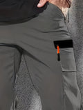 Pantalones cargo con puños y bolsillos de solapa para hombre, de color liso, transpirables y cómodos para actividades al aire libre.