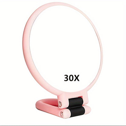Espejo de maquillaje de mano de doble cara con aumento de 1X/30X y mango ajustable 360°. Diseño portátil y plegable para un cuidado preciso. Ideal para viajes. No necesita pilas. Marco negro con detalles dorados. Mini espejo.