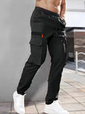 Pantalones cargo con puños y bolsillos de solapa para hombre, de color liso, transpirables y cómodos para actividades al aire libre.