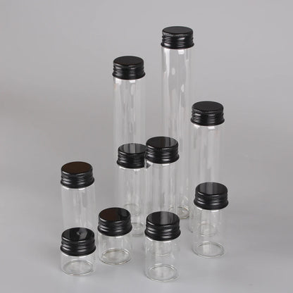 12 pieces/lot 10ml 15ml 20ml 25ml 30ml 40ml 50ml 60ml 80ml 100ml Glass Bottles With Black Aluminum Caps Potion Spice Jars Vails