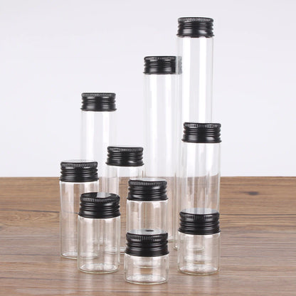 12 pieces/lot 10ml 15ml 20ml 25ml 30ml 40ml 50ml 60ml 80ml 100ml Glass Bottles With Black Aluminum Caps Potion Spice Jars Vails