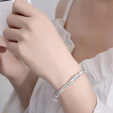 Pulsera de plata con flores para mujer, ajustable, delicada y abierta, color liso. 