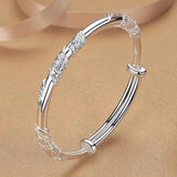 Pulsera de plata con flores para mujer, ajustable, delicada y abierta, color liso. 