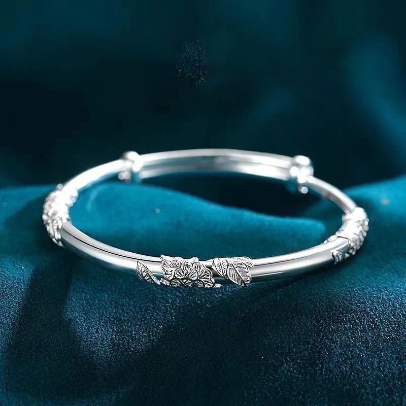 Pulsera de plata con flores para mujer, ajustable, delicada y abierta, color liso. 