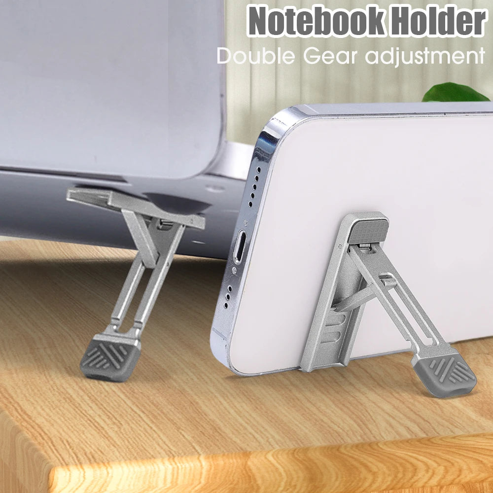 Mini soporte plegable ajustable de aleación de zinc para teléfono móvil, portátil, autoadhesivo, invisible.
