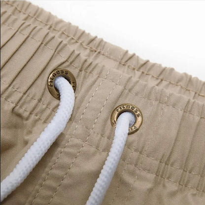 Bañador corto para hombre, de secado rápido, transpirable, con cordón y bolsillos para surfear en la playa en verano.