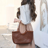 French Leather Woven Bag Fashion Simple Basket Bag Retro Advanced Handmade Bag New Versatile Commuting Women's Shoulder Handbag