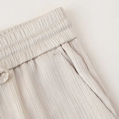 Conjunto de chaqueta y pantalón de traje cruzado con efecto arrugado para mujer, primavera y verano 2024, estilo europeo y americano