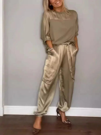 Conjunto de dos piezas de satén de color liso para mujer, moda de primavera y verano, nuevo conjunto de dos piezas con cuello redondo, manga larga, pantalones largos, informal y holgado.