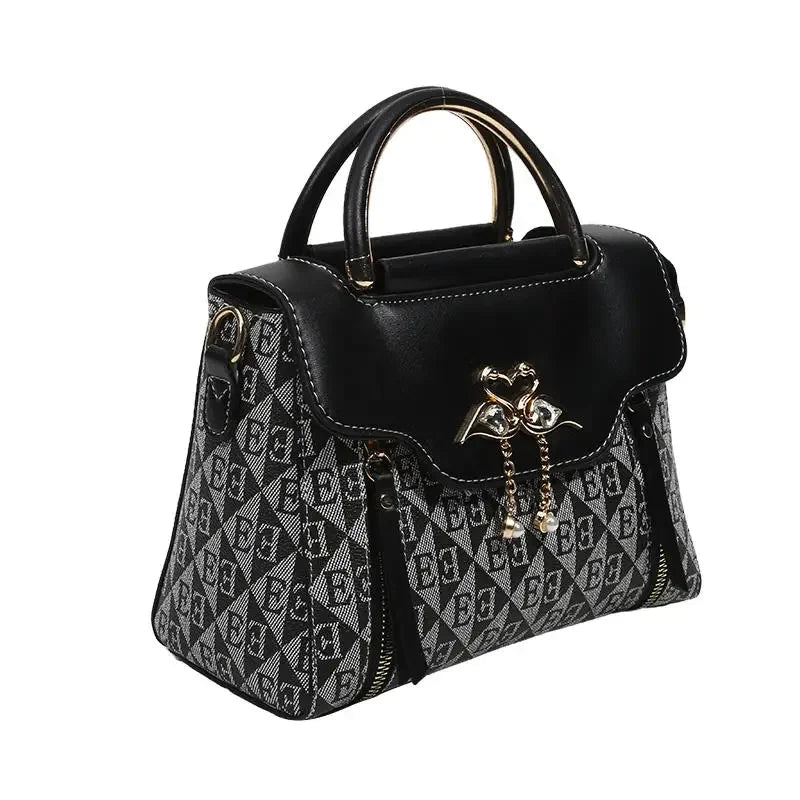 Ladies' handbag 2026 new fashion trend embossed plain style versatile casual shoulder crossbody bag.