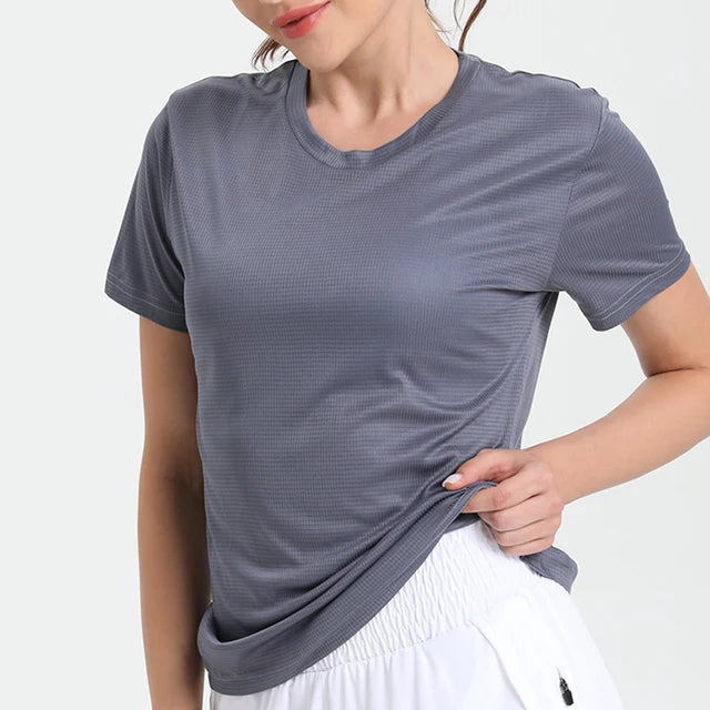 T-shirt desportiva de secagem rápida para mulher, cor sólida, ultraleve, respirável, leve, para corrida e ginásio