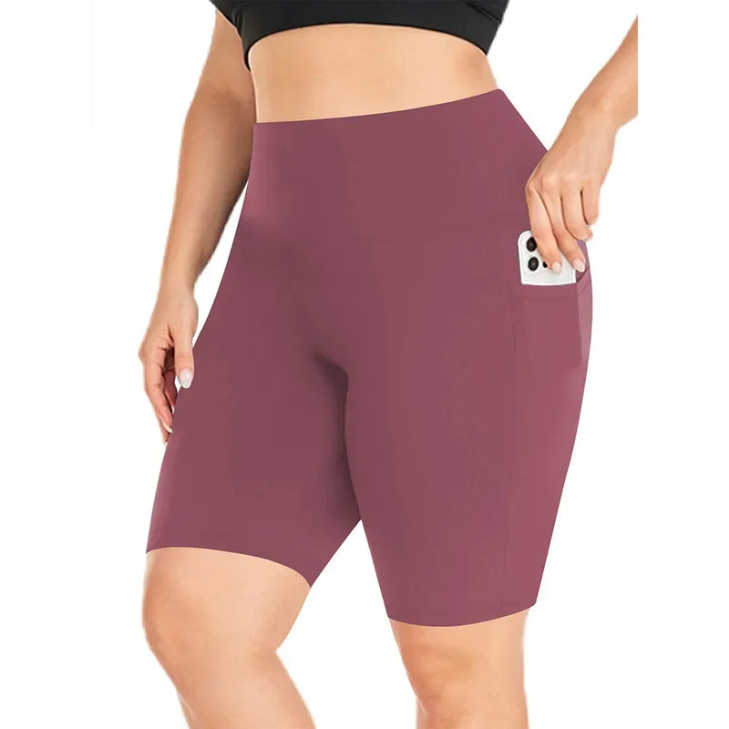 Pantalones cortos negros de talla grande para mujer, elegantes pantalones de yoga elásticos, leggings de tiro medio, perfectos para actividades al aire libre y fitness. 
