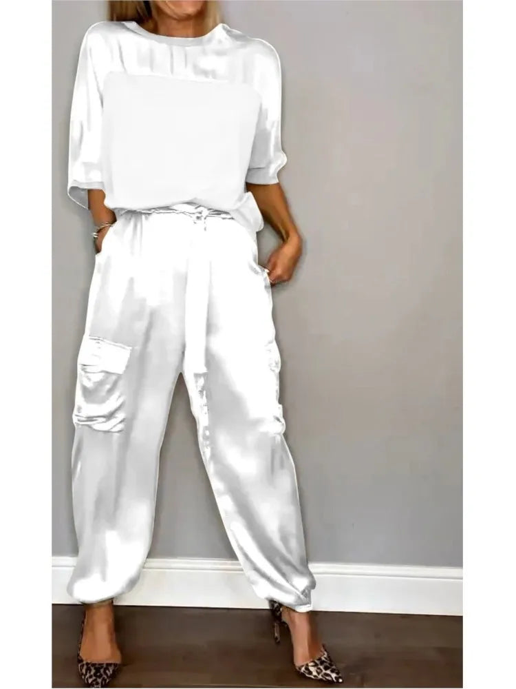 Conjunto de dos piezas de satén de color liso para mujer, moda de primavera y verano, nuevo conjunto de dos piezas con cuello redondo, manga larga, pantalones largos, informal y holgado.