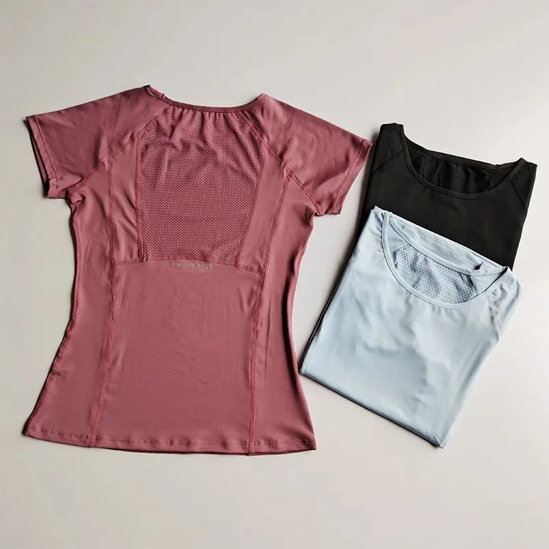 Camiseta deportiva de manga corta para mujer, cuello redondo, malla transpirable de secado rápido para yoga y fitness. 