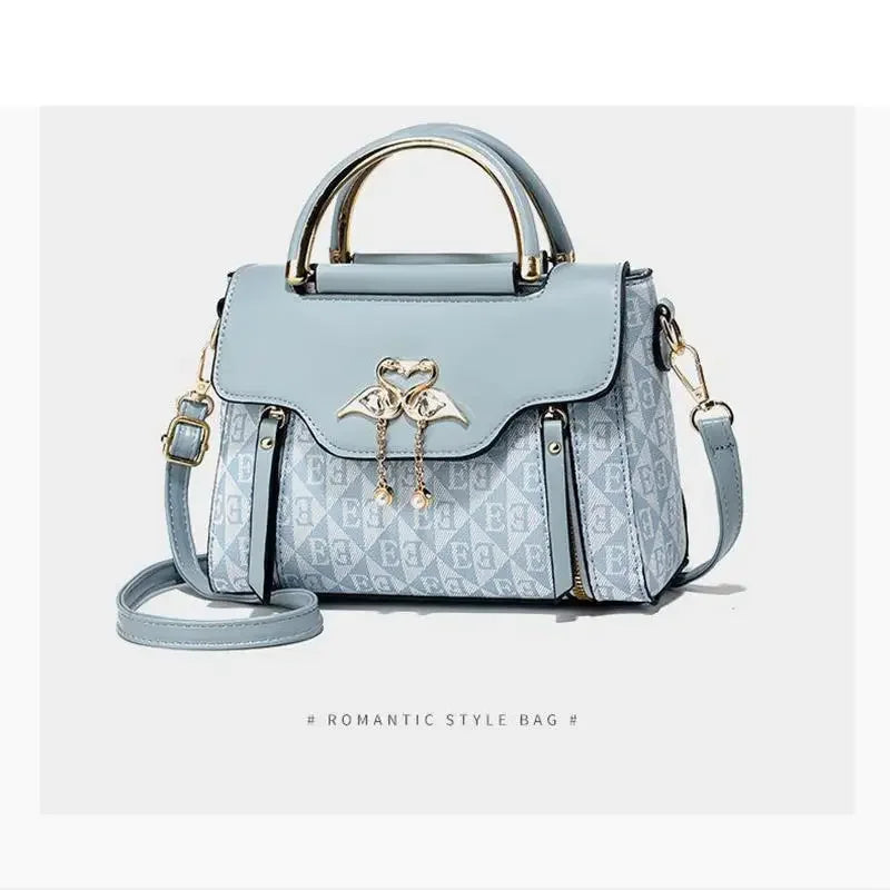 Ladies' handbag 2026 new fashion trend embossed plain style versatile casual shoulder crossbody bag.
