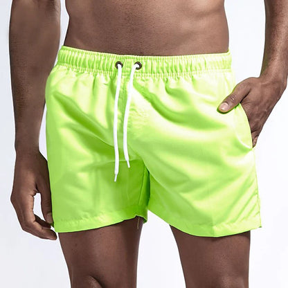 Bañador corto para hombre, de secado rápido, transpirable, con cordón y bolsillos para surfear en la playa en verano.