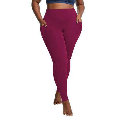 Pantalones deportivos de cintura alta de talla grande con bolsillos laterales dobles, cómodos para yoga y entrenamiento. 