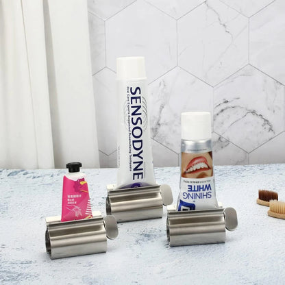 Accesorios de baño Exprimidor de pasta de dientes con rodillo de acero inoxidable, dispensador giratorio para ungüentos y cosméticos