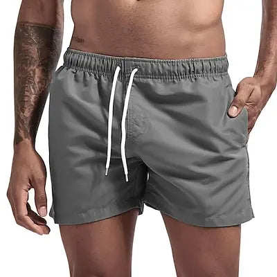 Bañador corto para hombre, de secado rápido, transpirable, con cordón y bolsillos para surfear en la playa en verano.