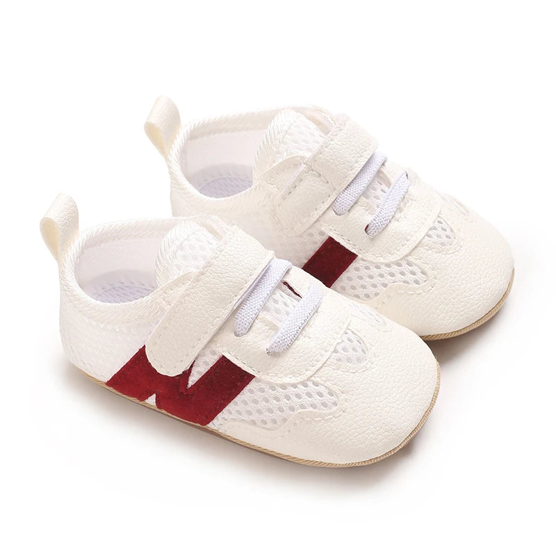 Zapatillas clásicas para bebés recién nacidos con letras entrelazadas, calzado informal antideslizante para caminar, para niños y niñas de 0 a 18 meses