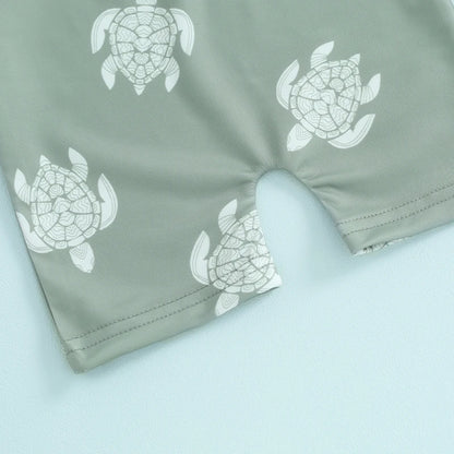 Traje de baño Tregren para niños pequeños, de manga larga, con estampado de tortuga y dinosaurio, con gorro de baño y ropa de playa.