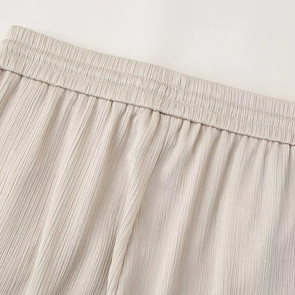 Conjunto de chaqueta y pantalón de traje cruzado con efecto arrugado para mujer, primavera y verano 2024, estilo europeo y americano