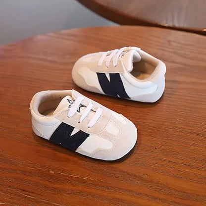 Zapatillas clásicas para bebés recién nacidos con letras entrelazadas, calzado informal antideslizante para caminar, para niños y niñas de 0 a 18 meses