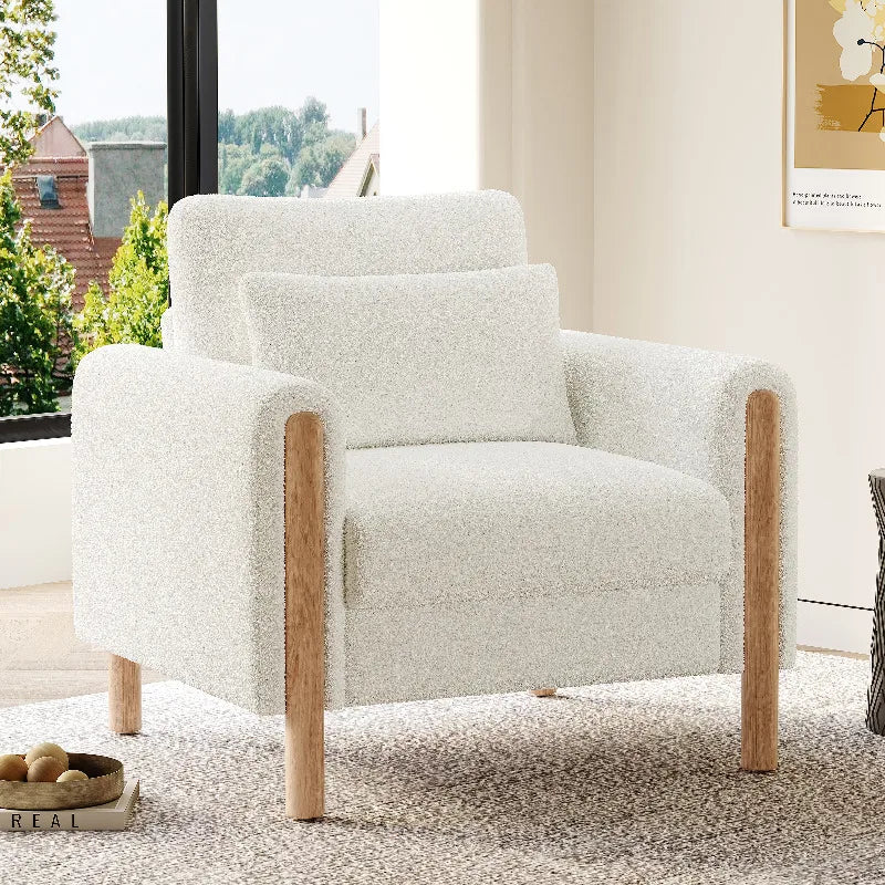 Modern armchair with thick cushions and a soft seat, suitable for reclining in the living room, office, or bedroom.