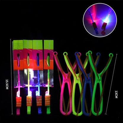 Increíble juguete luminoso, flecha LED, juguetes para fiestas al aire libre, divertido regalo, banda elástica, catapulta que brilla en la oscuridad, cohete, helicóptero, juguete volador.