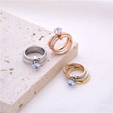 FYSARA Anillo de acero inoxidable de tres colores con diseño abombado, elegante anillo de compromiso con cristales de circón para niñas y mujeres, regalo al por mayor