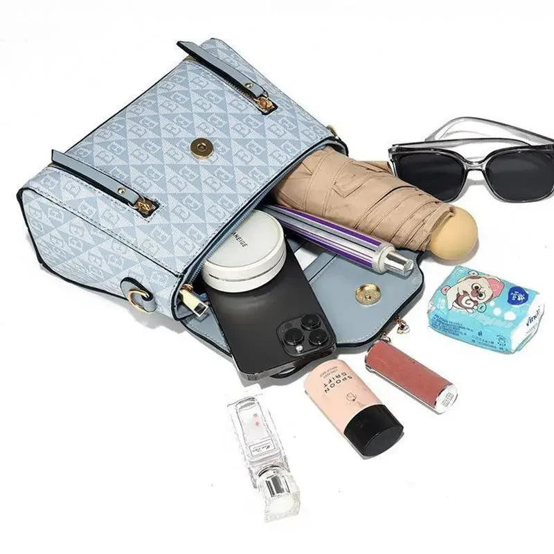 Ladies' handbag 2026 new fashion trend embossed plain style versatile casual shoulder crossbody bag.