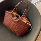 French Leather Woven Bag Fashion Simple Basket Bag Retro Advanced Handmade Bag New Versatile Commuting Women's Shoulder Handbag
