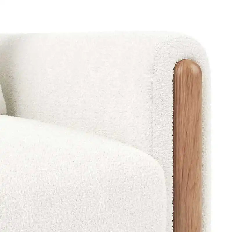 Modern armchair with thick cushions and a soft seat, suitable for reclining in the living room, office, or bedroom.