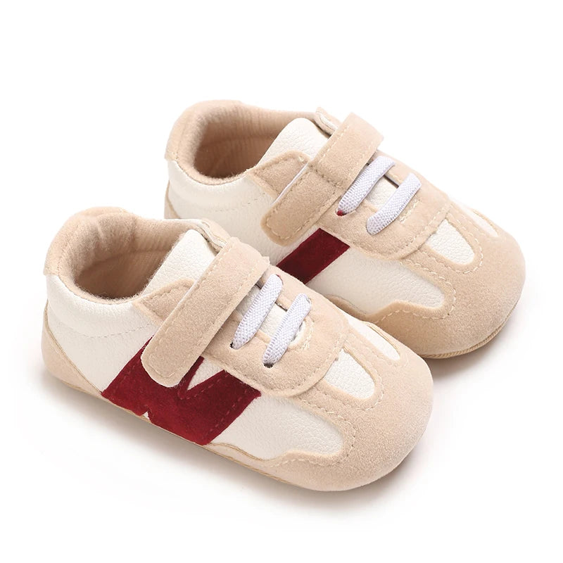 Zapatillas clásicas para bebés recién nacidos con letras entrelazadas, calzado informal antideslizante para caminar, para niños y niñas de 0 a 18 meses