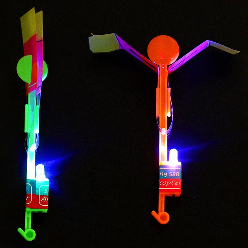 Increíble juguete luminoso, flecha LED, juguetes para fiestas al aire libre, divertido regalo, banda elástica, catapulta que brilla en la oscuridad, cohete, helicóptero, juguete volador.