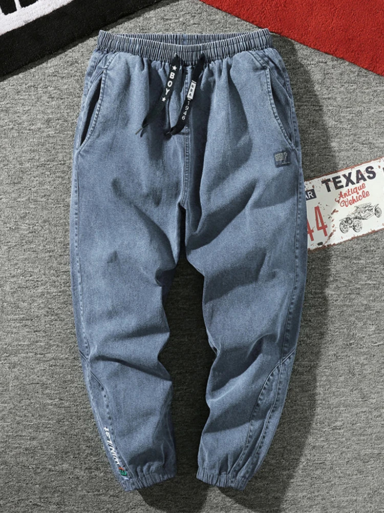 Pantalones vaqueros jogger para hombre, tallas grandes 6XL, 7XL y 8XL, estilo urbano, negros y azules, informales, de algodón elástico, holgados.