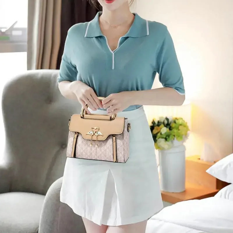 Ladies' handbag 2026 new fashion trend embossed plain style versatile casual shoulder crossbody bag.