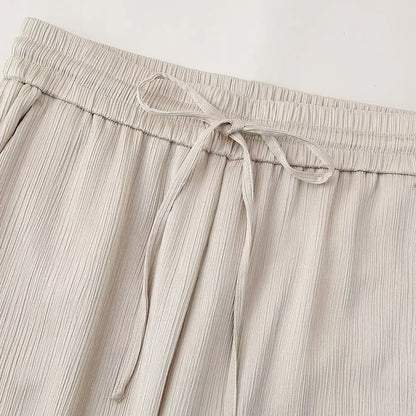 Conjunto de chaqueta y pantalón de traje cruzado con efecto arrugado para mujer, primavera y verano 2024, estilo europeo y americano