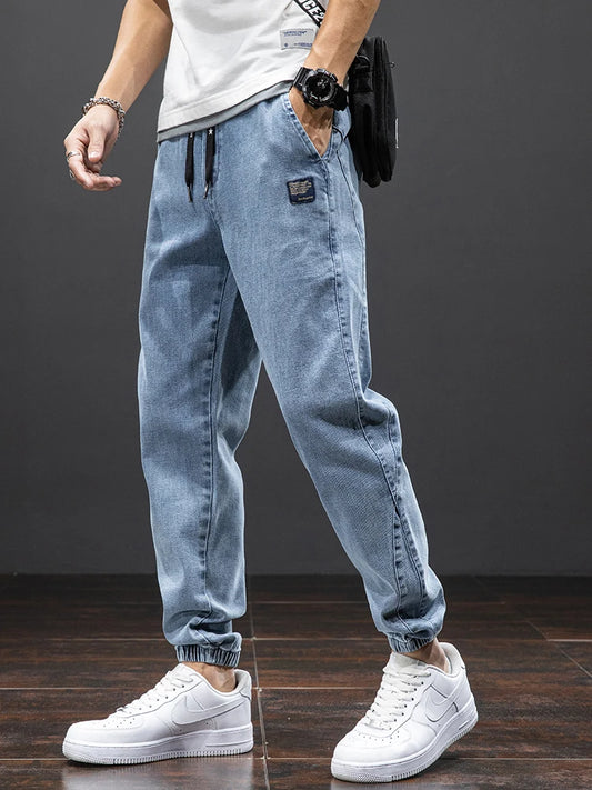 Pantalones vaqueros cargo negros y azules para hombre, ropa de calle, pantalones jogger holgados tipo harén, de talla grande, para primavera y verano
